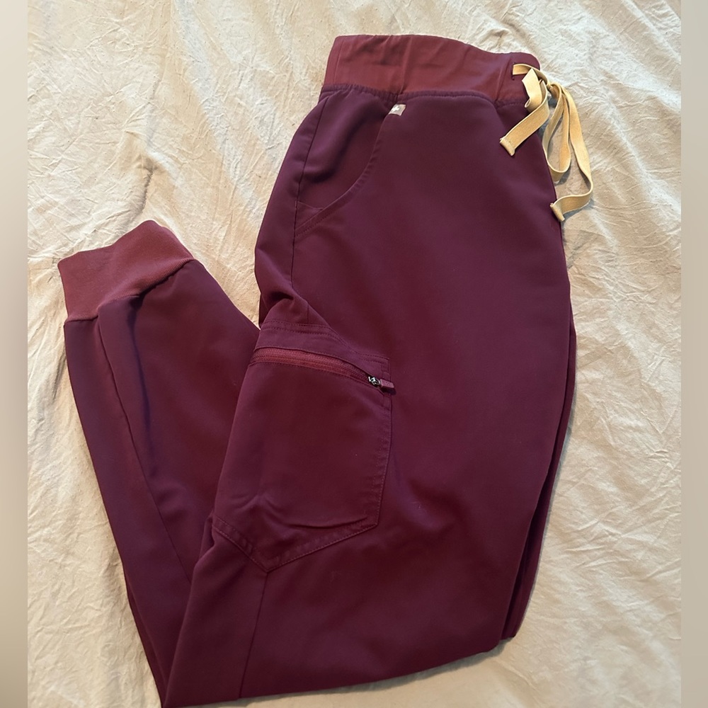 Woman’s dark purple Figs Zamora jogger scrubs